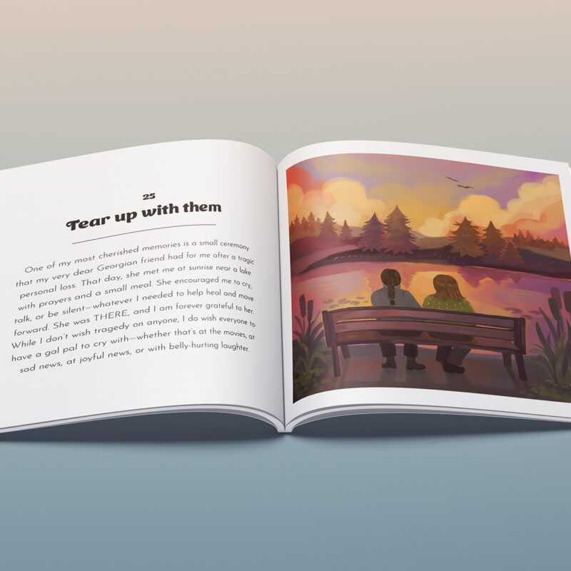 Book open to a spread with a sunset illustration